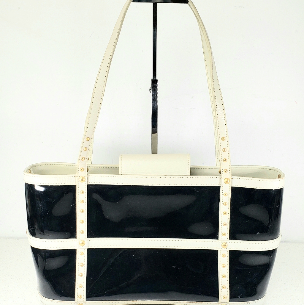 Maxx New York Black + White Pvc And Leather Handbag With Gold Studs